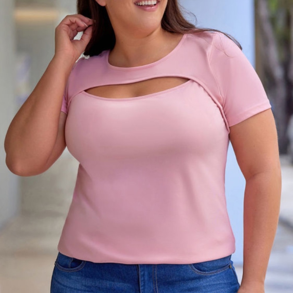 Short sleeve pink top with peekaboo front. New in bag, unbranded. Work or play